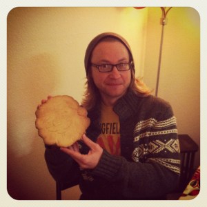 ray showing off his giant sugar cookie